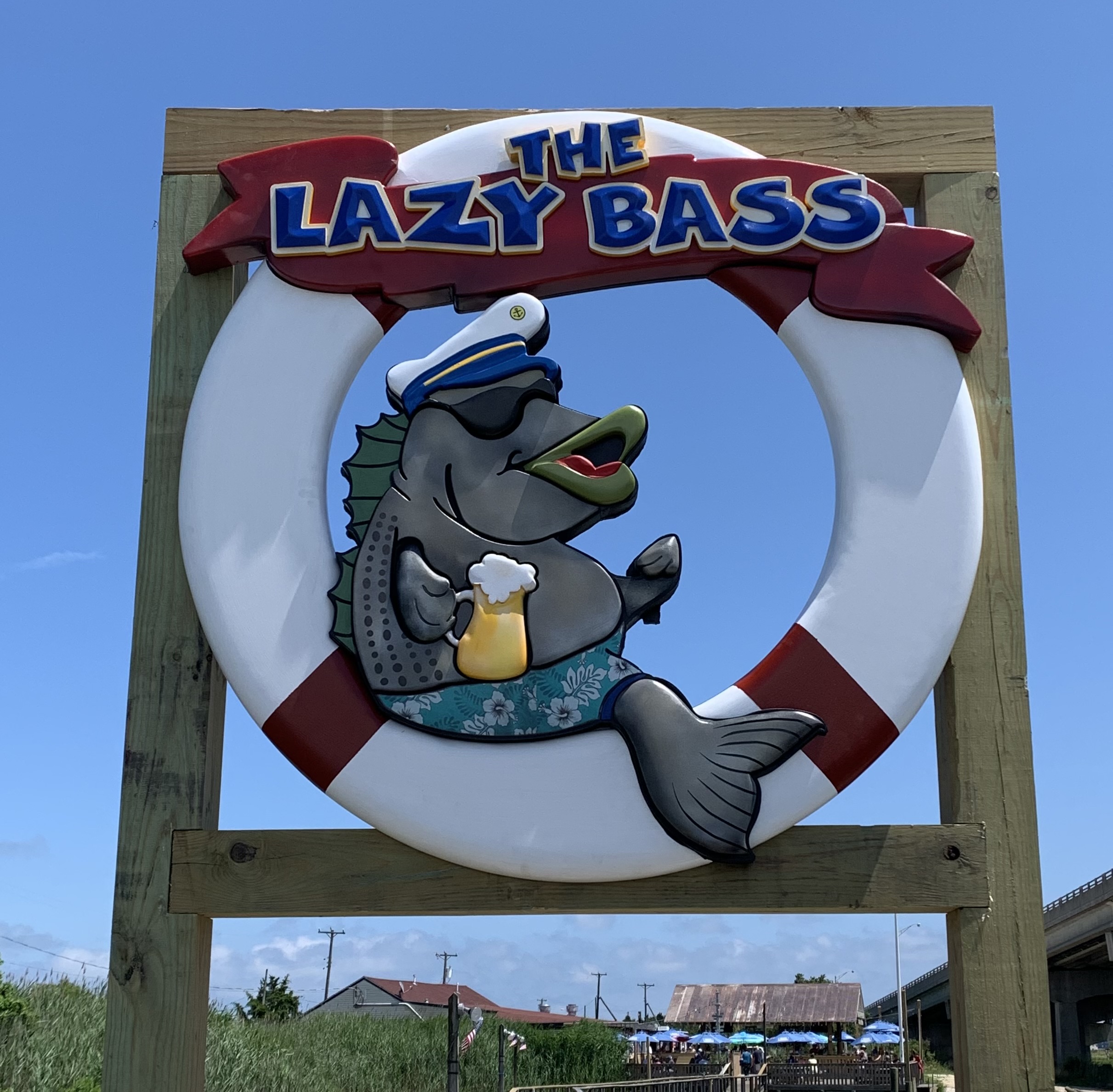 The Lazy Bass carved sign