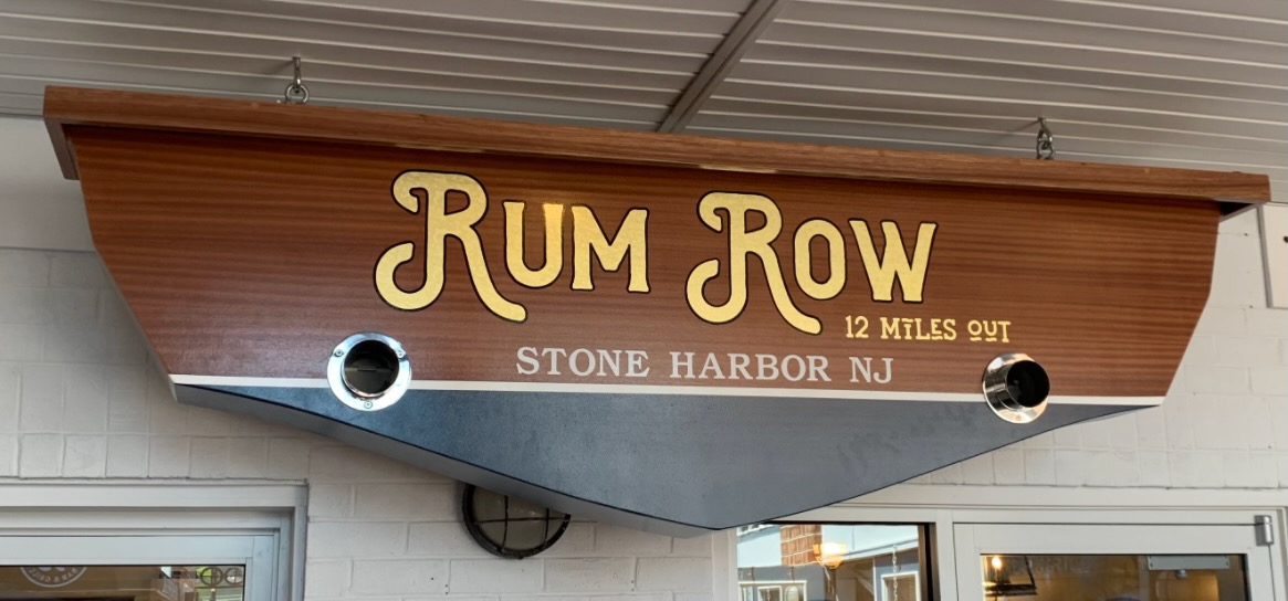 Rum Row carved boat sign